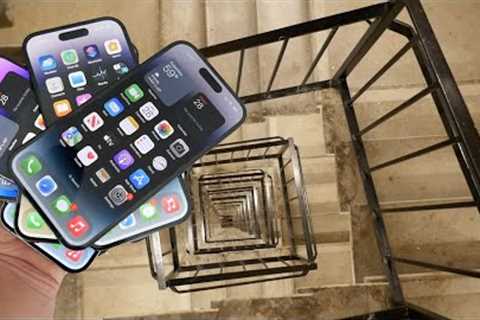 Dropping a Stack of (7) iPhone 14 Pro''''s Down Crazy Spiral Staircase 300 Feet - Will They Survive?