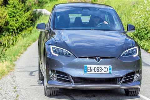 Explore How Race Car Fabrication Principles Elevate Tesla Certified Collision Center Repairs in..